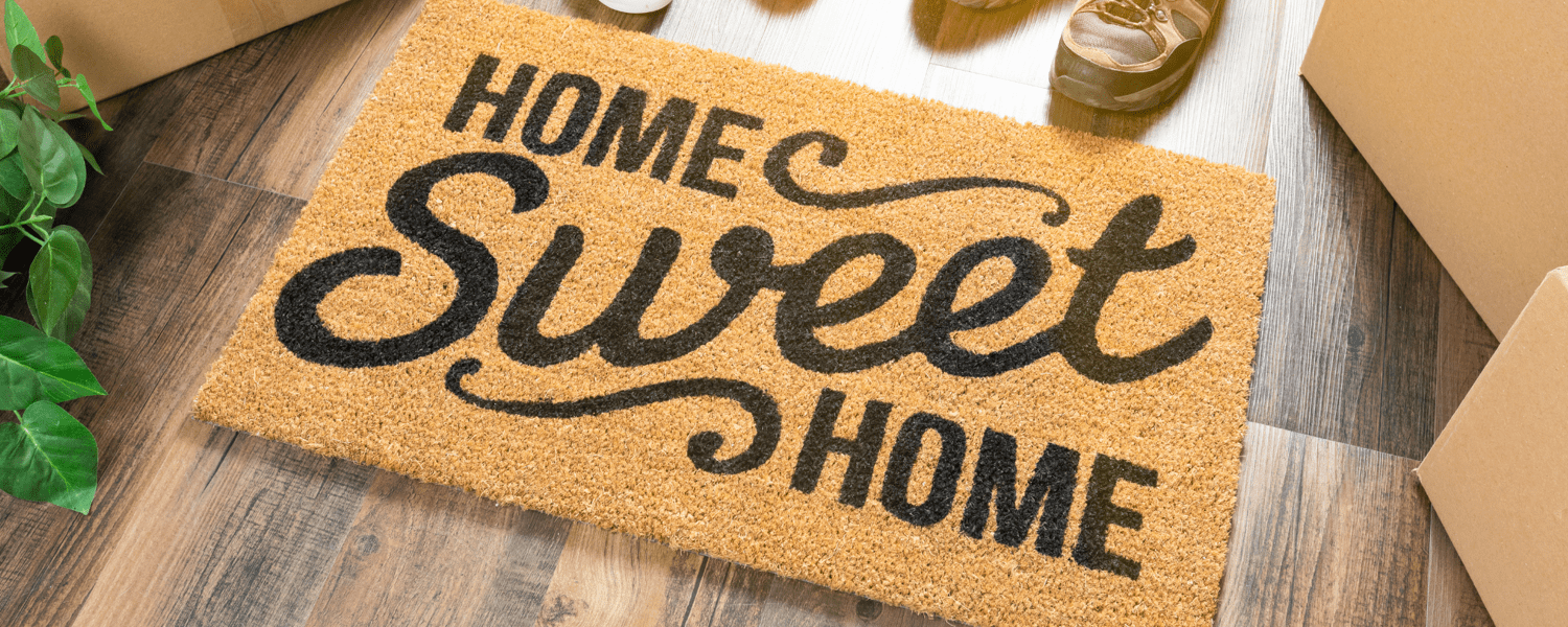Doormat with home sweet home wording on